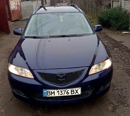 Синий Мазда 6, объемом двигателя 1.8 л и пробегом 231 тыс. км за 3100 $, фото 1 на Automoto.ua