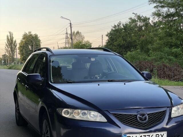 Синий Мазда 6, объемом двигателя 1.8 л и пробегом 237 тыс. км за 3300 $, фото 1 на Automoto.ua