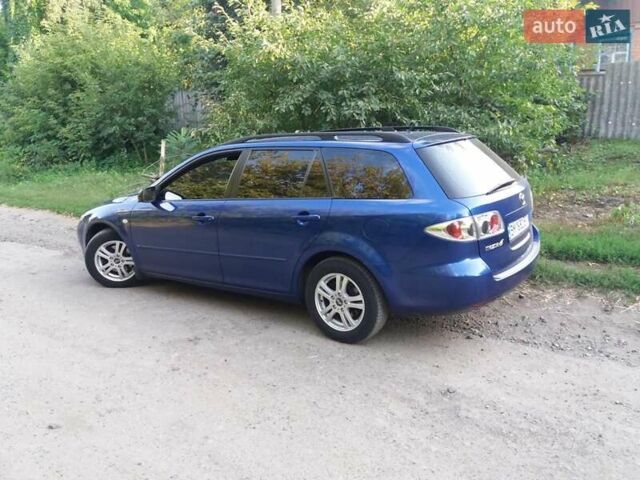 Синий Мазда 6, объемом двигателя 1.8 л и пробегом 226 тыс. км за 4400 $, фото 1 на Automoto.ua