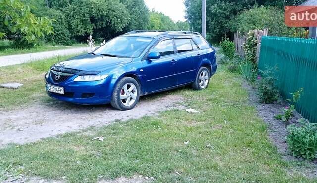 Синий Мазда 6, объемом двигателя 2 л и пробегом 245 тыс. км за 4200 $, фото 1 на Automoto.ua