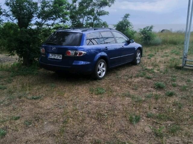 Синий Мазда 6, объемом двигателя 2 л и пробегом 220 тыс. км за 6400 $, фото 1 на Automoto.ua