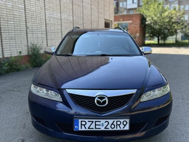Синій Мазда 6, об'ємом двигуна 2 л та пробігом 333 тис. км за 2500 $, фото 1 на Automoto.ua