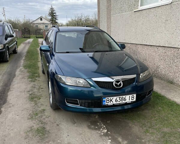 Синий Мазда 6, объемом двигателя 2 л и пробегом 310 тыс. км за 4200 $, фото 1 на Automoto.ua