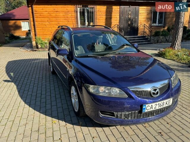 Синій Мазда 6, об'ємом двигуна 1.8 л та пробігом 229 тис. км за 5500 $, фото 1 на Automoto.ua