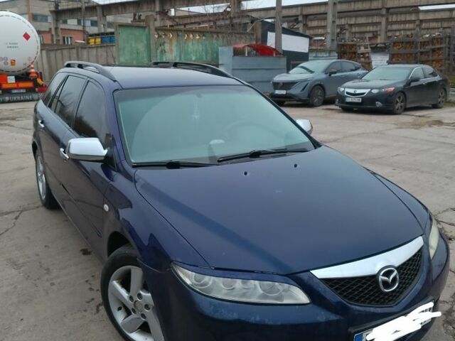 Синий Мазда 6, объемом двигателя 2 л и пробегом 297 тыс. км за 2600 $, фото 1 на Automoto.ua