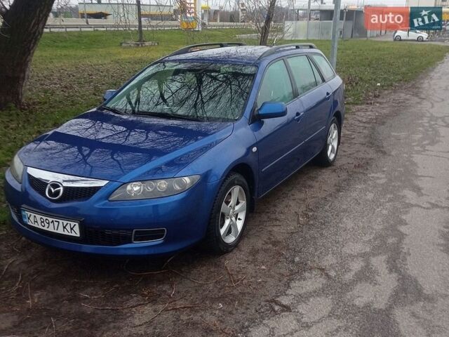Синий Мазда 6, объемом двигателя 1.8 л и пробегом 245 тыс. км за 4200 $, фото 1 на Automoto.ua