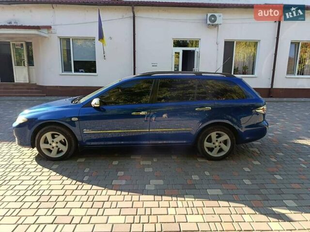 Синій Мазда 6, об'ємом двигуна 2 л та пробігом 268 тис. км за 4500 $, фото 1 на Automoto.ua
