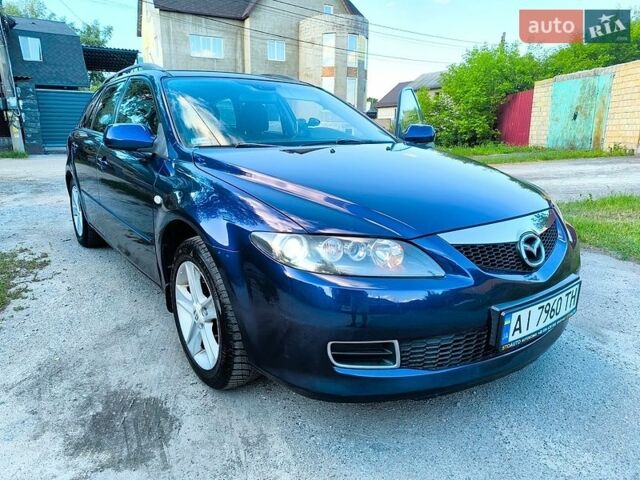 Синий Мазда 6, объемом двигателя 1.8 л и пробегом 231 тыс. км за 3900 $, фото 1 на Automoto.ua