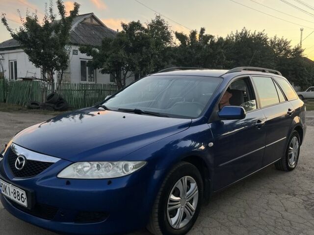 Синій Мазда 6, об'ємом двигуна 1.8 л та пробігом 250 тис. км за 2199 $, фото 1 на Automoto.ua