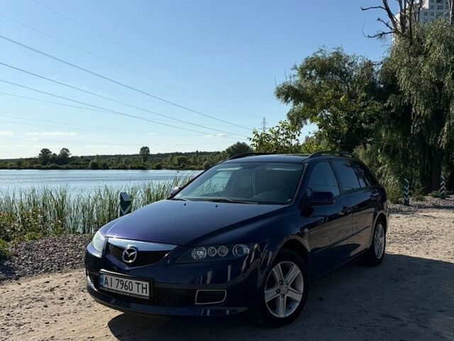 Синий Мазда 6, объемом двигателя 1.8 л и пробегом 235 тыс. км за 4200 $, фото 1 на Automoto.ua