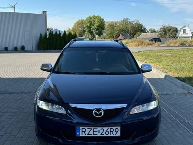 Синий Мазда 6, объемом двигателя 2 л и пробегом 320 тыс. км за 1899 $, фото 1 на Automoto.ua