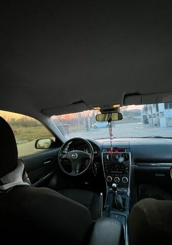 Синій Мазда 6, об'ємом двигуна 2 л та пробігом 320 тис. км за 2499 $, фото 1 на Automoto.ua
