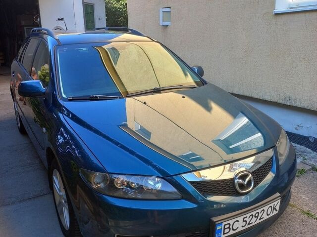 Синий Мазда 6, объемом двигателя 2 л и пробегом 249 тыс. км за 3600 $, фото 1 на Automoto.ua