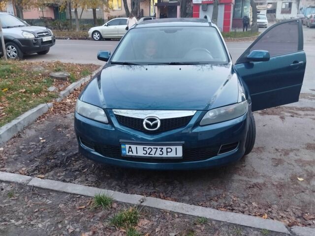 Синий Мазда 6, объемом двигателя 2 л и пробегом 240 тыс. км за 3700 $, фото 1 на Automoto.ua
