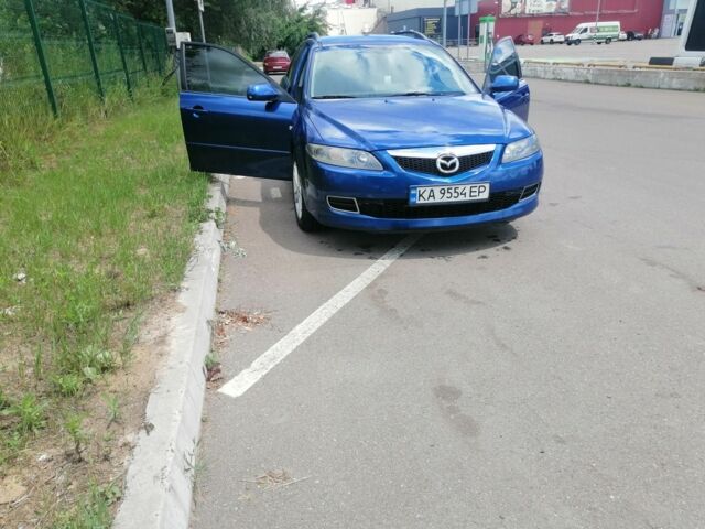 Синий Мазда 6, объемом двигателя 2 л и пробегом 250 тыс. км за 5500 $, фото 1 на Automoto.ua