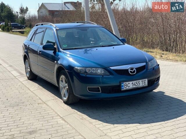 Синий Мазда 6, объемом двигателя 2 л и пробегом 318 тыс. км за 4300 $, фото 1 на Automoto.ua