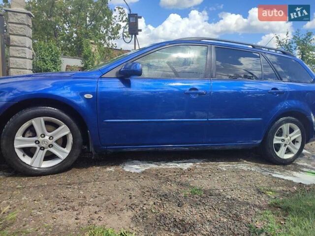 Синій Мазда 6, об'ємом двигуна 2 л та пробігом 313 тис. км за 3500 $, фото 1 на Automoto.ua