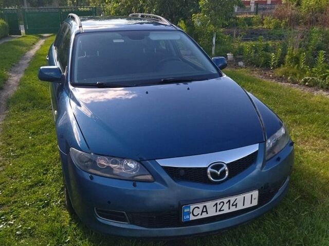 Синий Мазда 6, объемом двигателя 2 л и пробегом 230 тыс. км за 5000 $, фото 1 на Automoto.ua