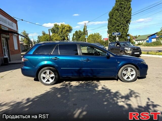 Синий Мазда 6, объемом двигателя 2 л и пробегом 261 тыс. км за 4900 $, фото 1 на Automoto.ua