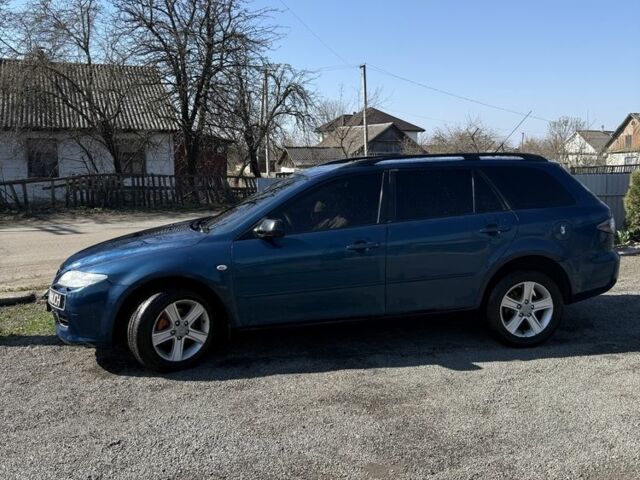Синій Мазда 6, об'ємом двигуна 2 л та пробігом 402 тис. км за 3102 $, фото 1 на Automoto.ua