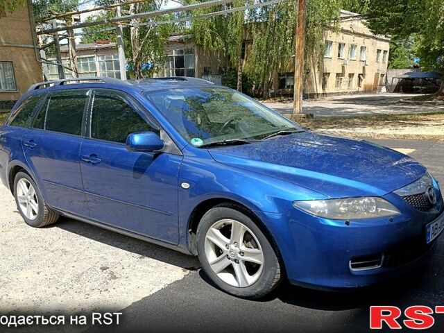 Синий Мазда 6, объемом двигателя 2 л и пробегом 203 тыс. км за 4000 $, фото 1 на Automoto.ua