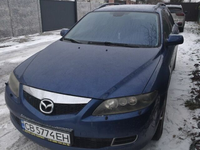 Синій Мазда 6, об'ємом двигуна 2 л та пробігом 243 тис. км за 5600 $, фото 1 на Automoto.ua