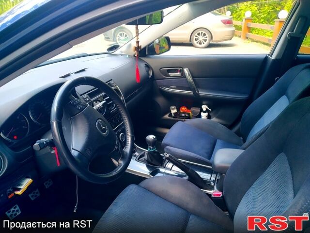 Синий Мазда 6, объемом двигателя 2 л и пробегом 320 тыс. км за 5500 $, фото 1 на Automoto.ua
