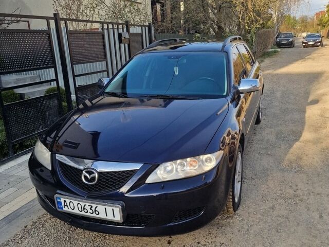 Синий Мазда 6, объемом двигателя 2 л и пробегом 293 тыс. км за 3999 $, фото 1 на Automoto.ua