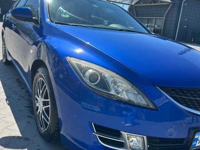 Синий Мазда 6, объемом двигателя 2 л и пробегом 313 тыс. км за 5500 $, фото 1 на Automoto.ua