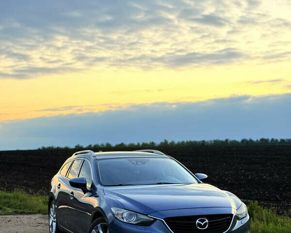 Синий Мазда 6, объемом двигателя 2.19 л и пробегом 251 тыс. км за 11500 $, фото 1 на Automoto.ua