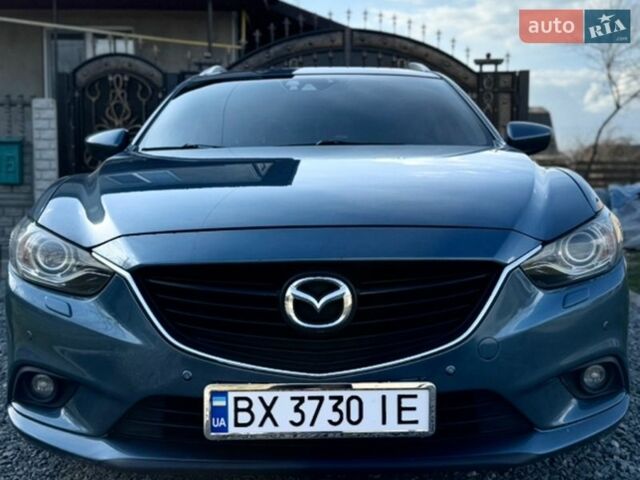 Синий Мазда 6, объемом двигателя 2.2 л и пробегом 209 тыс. км за 11500 $, фото 1 на Automoto.ua