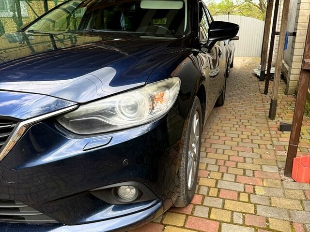 Синий Мазда 6, объемом двигателя 2.2 л и пробегом 265 тыс. км за 11000 $, фото 1 на Automoto.ua