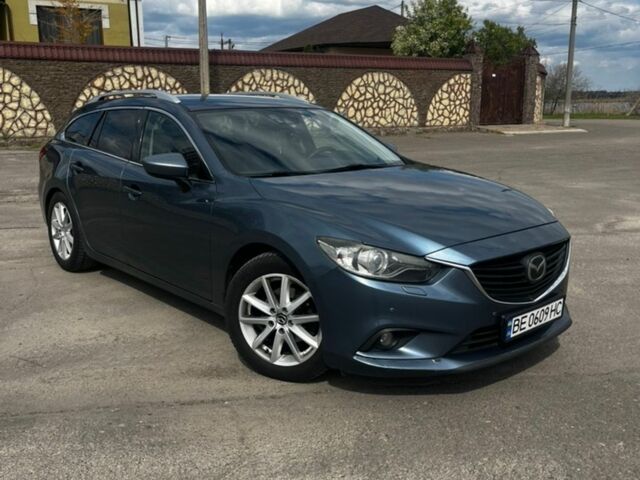 Синий Мазда 6, объемом двигателя 2.18 л и пробегом 273 тыс. км за 11599 $, фото 1 на Automoto.ua