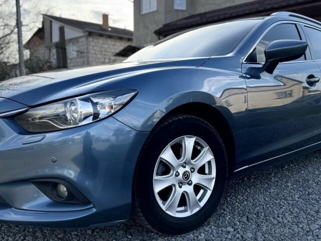 Синий Мазда 6, объемом двигателя 2.2 л и пробегом 209 тыс. км за 10083 $, фото 1 на Automoto.ua