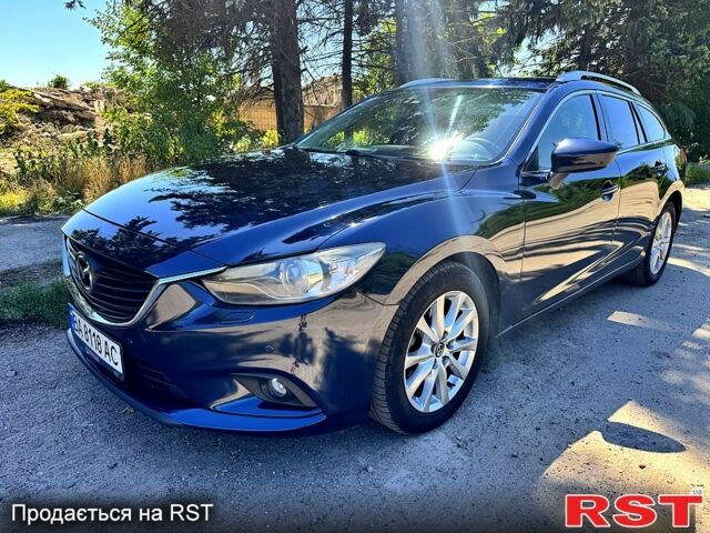 Синий Мазда 6, объемом двигателя 2.2 л и пробегом 266 тыс. км за 11000 $, фото 1 на Automoto.ua