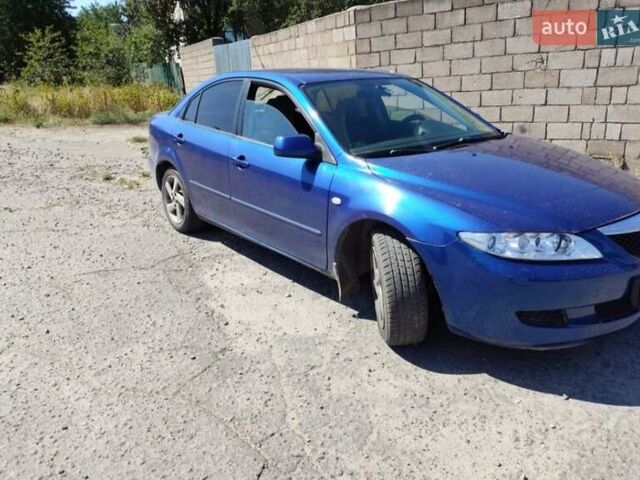 Синий Мазда 6, объемом двигателя 2 л и пробегом 257 тыс. км за 3300 $, фото 1 на Automoto.ua