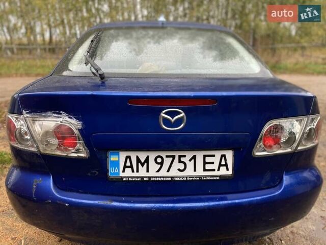 Синий Мазда 6, объемом двигателя 2 л и пробегом 250 тыс. км за 2950 $, фото 1 на Automoto.ua