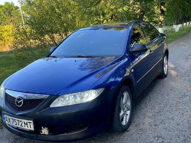 Синий Мазда 6, объемом двигателя 1.8 л и пробегом 345 тыс. км за 4000 $, фото 1 на Automoto.ua