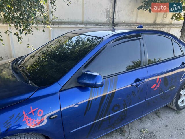 Синий Мазда 6, объемом двигателя 2 л и пробегом 400 тыс. км за 4700 $, фото 1 на Automoto.ua