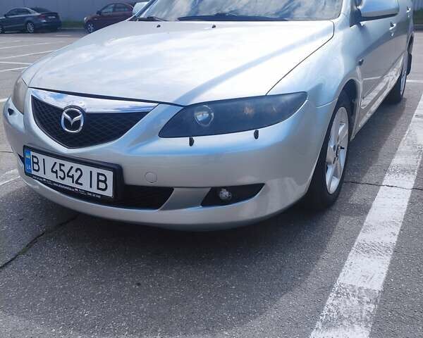 Синий Мазда 6, объемом двигателя 2 л и пробегом 300 тыс. км за 5500 $, фото 1 на Automoto.ua