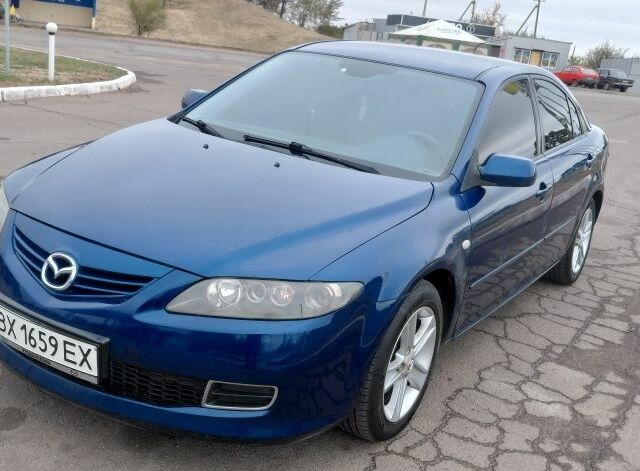Синий Мазда 6, объемом двигателя 2 л и пробегом 168 тыс. км за 3300 $, фото 1 на Automoto.ua