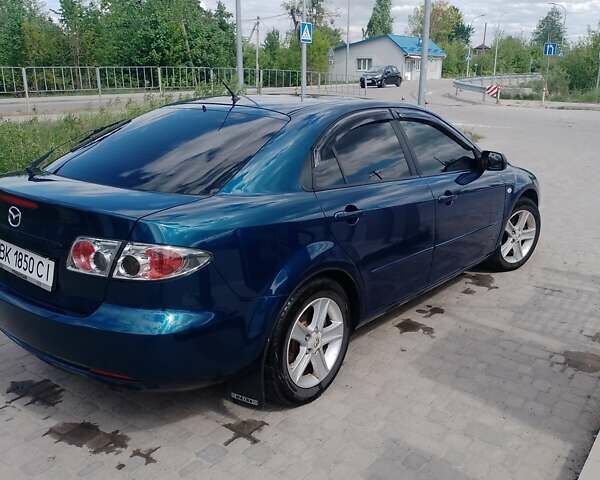 Синій Мазда 6, об'ємом двигуна 2 л та пробігом 240 тис. км за 4000 $, фото 1 на Automoto.ua