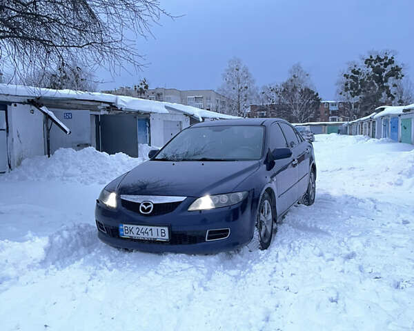 Синій Мазда 6, об'ємом двигуна 2 л та пробігом 333 тис. км за 4000 $, фото 1 на Automoto.ua