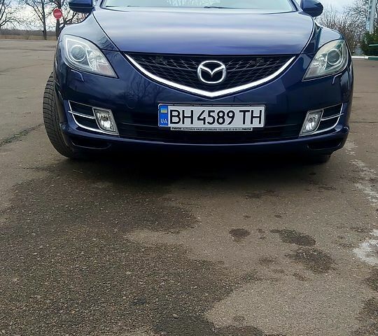 Синий Мазда 6, объемом двигателя 2 л и пробегом 245 тыс. км за 7500 $, фото 1 на Automoto.ua