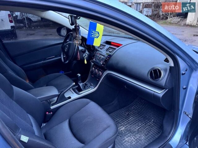 Синий Мазда 6, объемом двигателя 2.18 л и пробегом 240 тыс. км за 7200 $, фото 1 на Automoto.ua