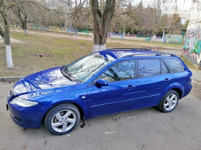 Синий Мазда 6, объемом двигателя 2 л и пробегом 300 тыс. км за 5800 $, фото 1 на Automoto.ua