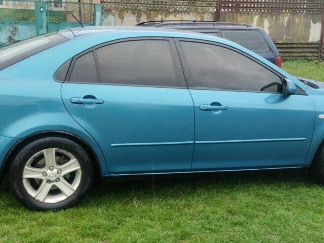 Зелений Мазда 6, об'ємом двигуна 2 л та пробігом 260 тис. км за 4600 $, фото 1 на Automoto.ua