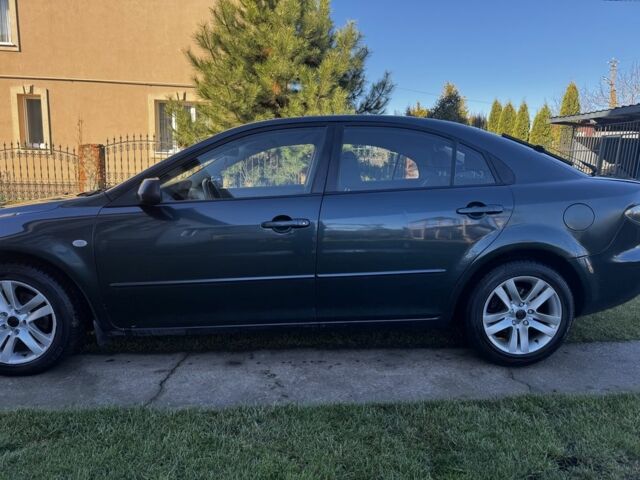 Зеленый Мазда 6, объемом двигателя 1.8 л и пробегом 230 тыс. км за 3950 $, фото 1 на Automoto.ua