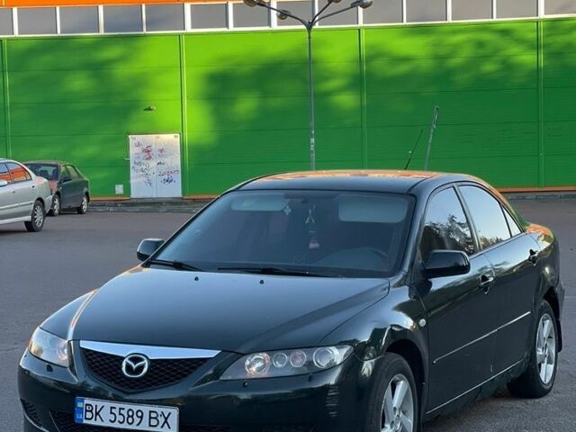 Зеленый Мазда 6, объемом двигателя 2 л и пробегом 327 тыс. км за 1800 $, фото 1 на Automoto.ua