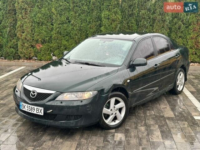 Зеленый Мазда 6, объемом двигателя 2 л и пробегом 328 тыс. км за 1650 $, фото 1 на Automoto.ua